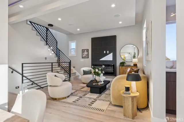 a backyard of a house with wooden floor outdoor seating and wooden floor