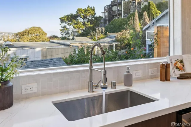 a bedroom with furniture and wooden floor
