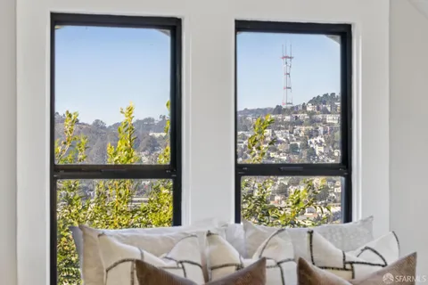 a living room with furniture and window