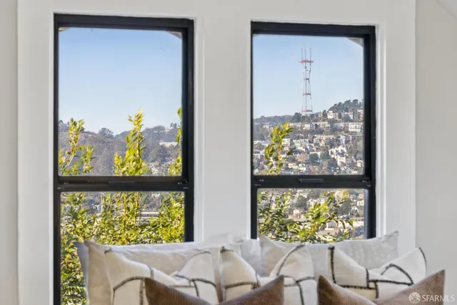 a living room with furniture and window