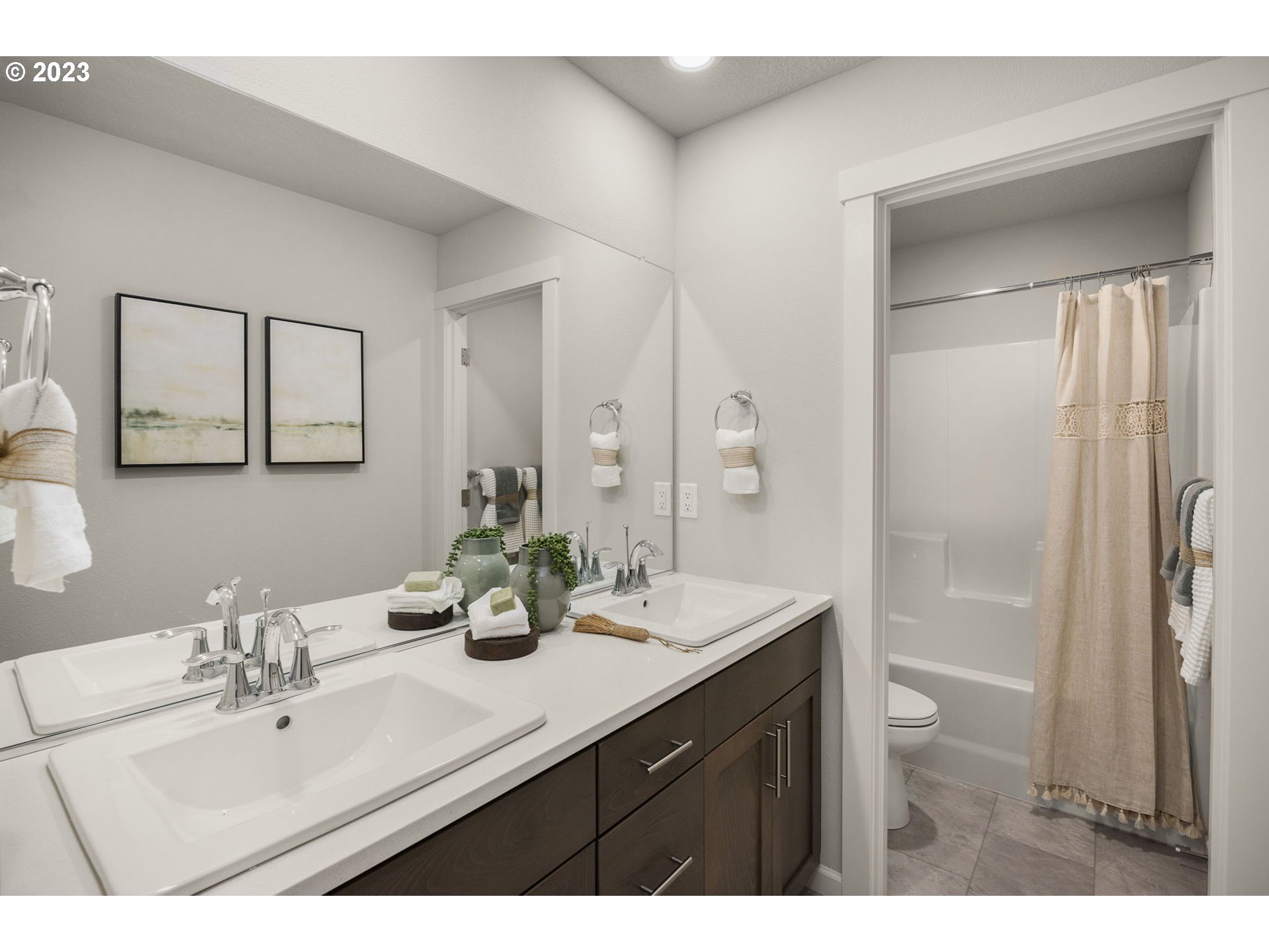 2824 South 7th Circle Ridgefield, WA 98642 - Photo 24 of 33 a bathroom with a double vanity sink mirror and double
