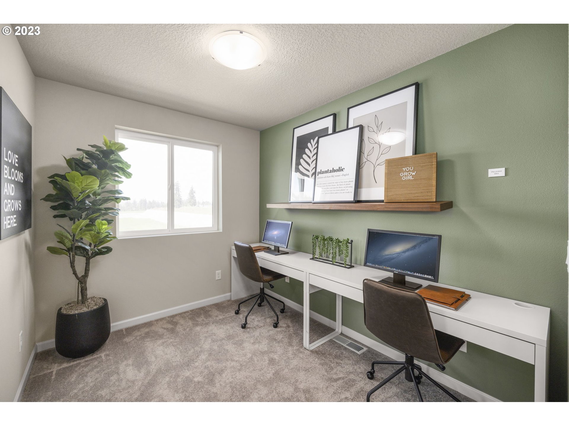 2824 South 7th Circle Ridgefield, WA 98642 - Photo 28 of 33 a workspace with furniture and a potted plant