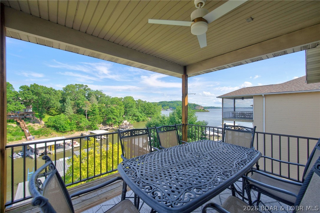 51 Arrowhead Beach Road Lake Ozark, MO 65049 - Photo 18 of 68 Covered deck upper level off dining room