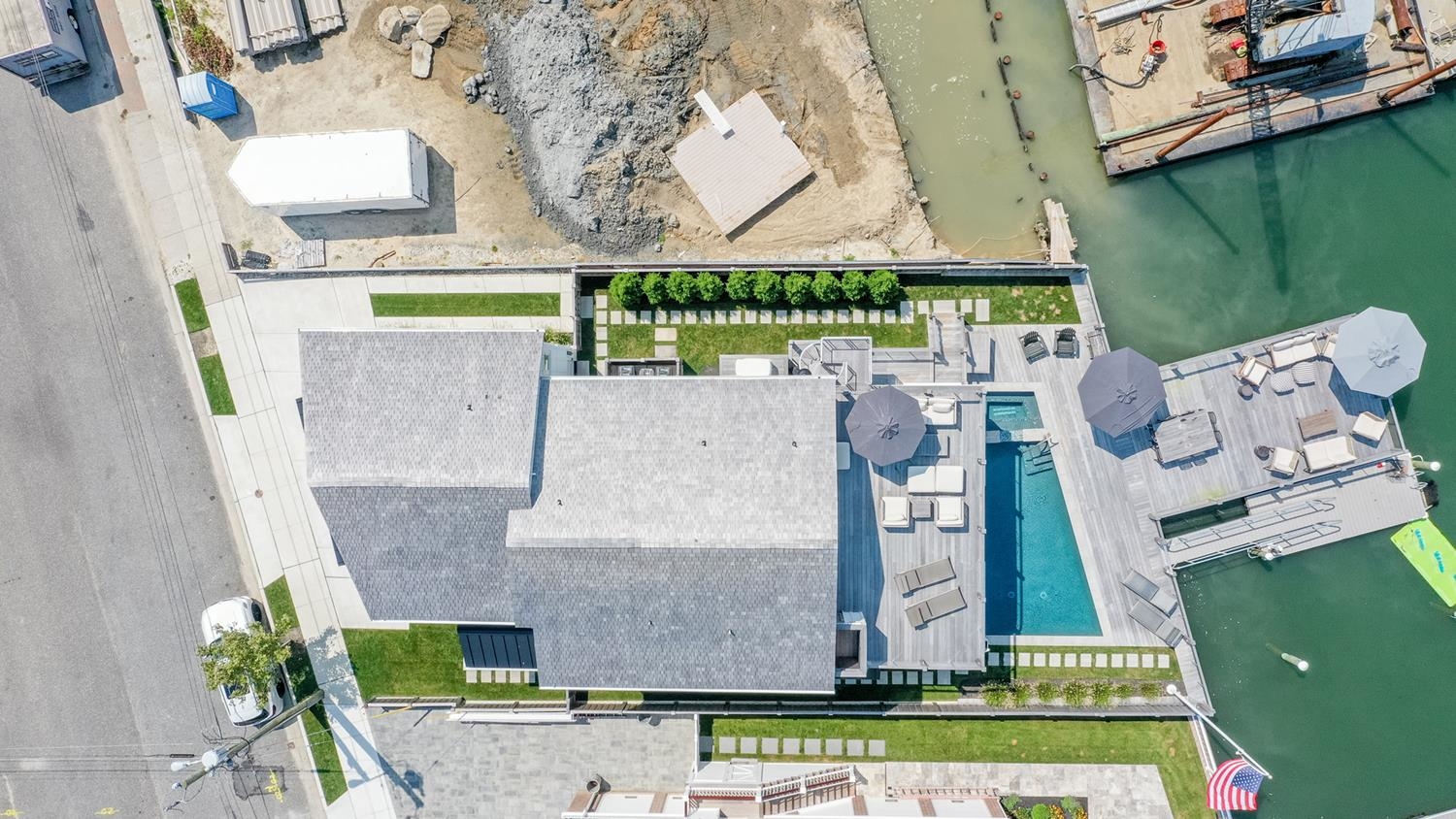 7708 Sunset Drive Avalon, NJ 08202 - Photo 2 of 37 an aerial view of a house with a swimming pool