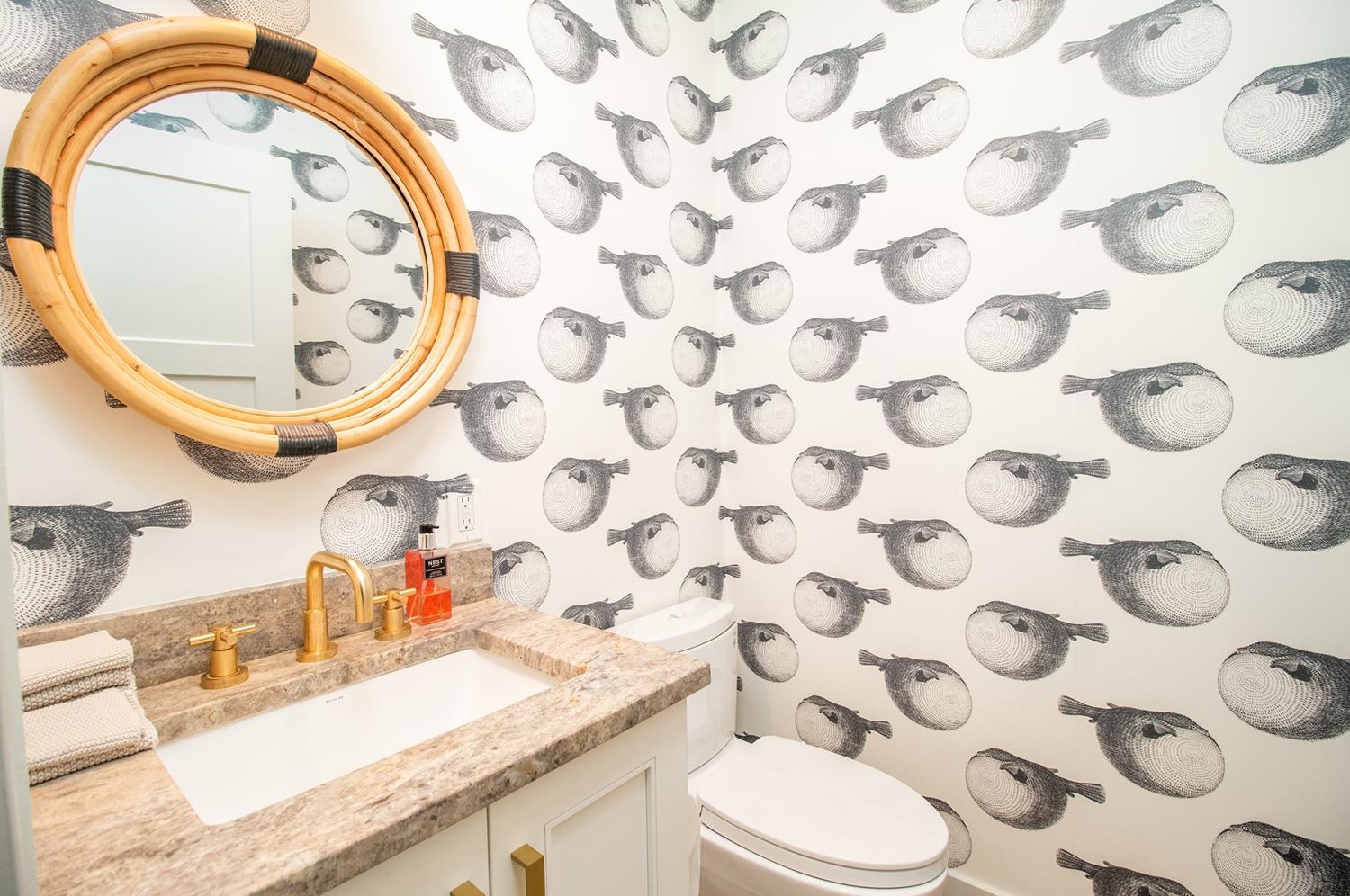 7708 Sunset Drive Avalon, NJ 08202 - Photo 19 of 37 a bathroom with a sink and a mirror