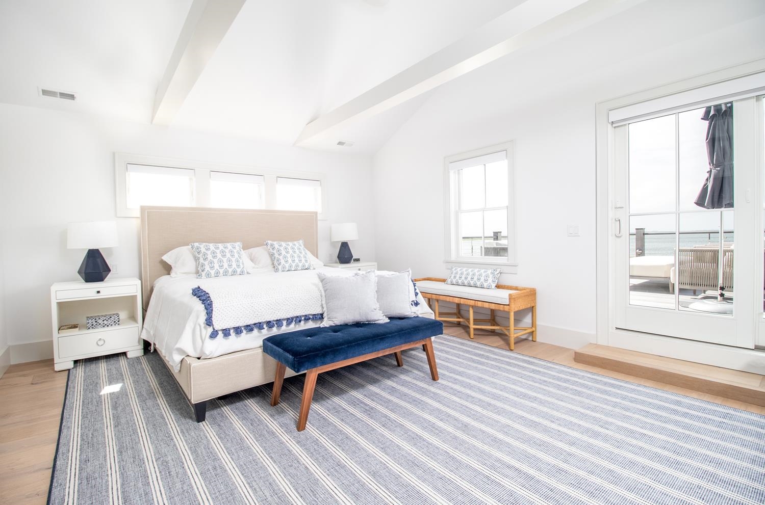 7708 Sunset Drive Avalon, NJ 08202 - Photo 23 of 37 a bedroom with a bed and a window