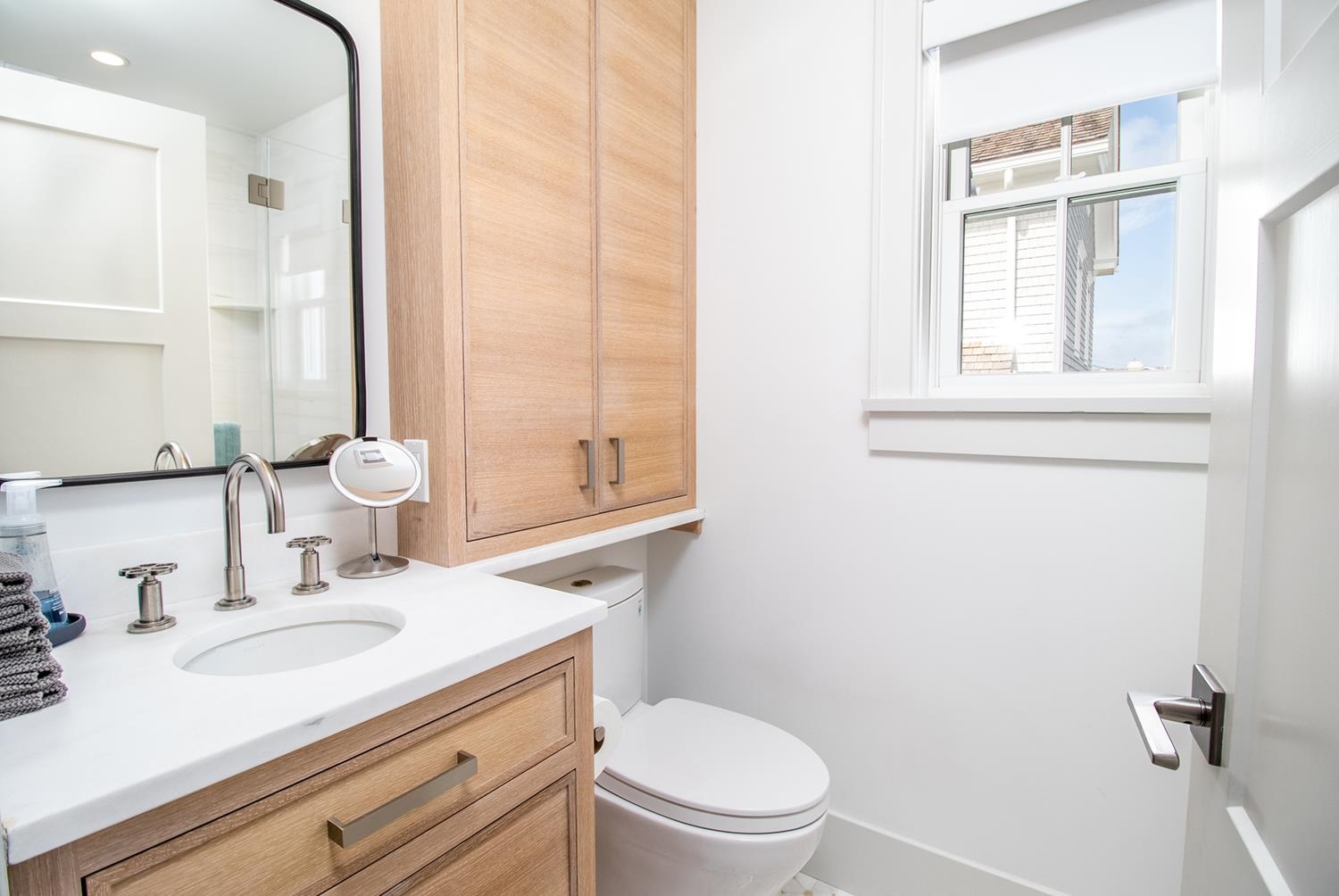 7708 Sunset Drive Avalon, NJ 08202 - Photo 30 of 37 a bathroom with a granite countertop sink mirror vanity and toilet
