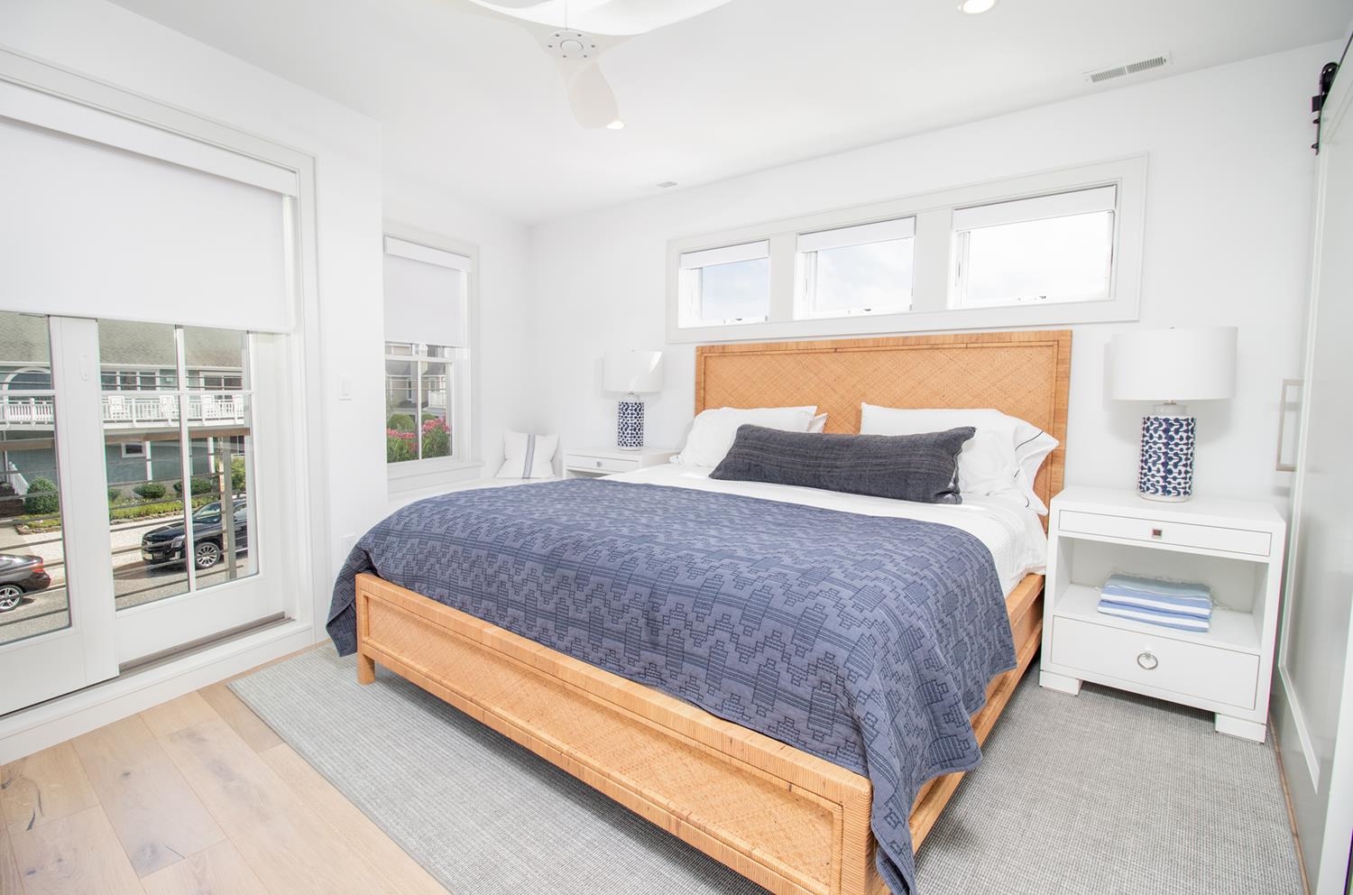 7708 Sunset Drive Avalon, NJ 08202 - Photo 32 of 37 a large bed sitting in a bedroom next to a window