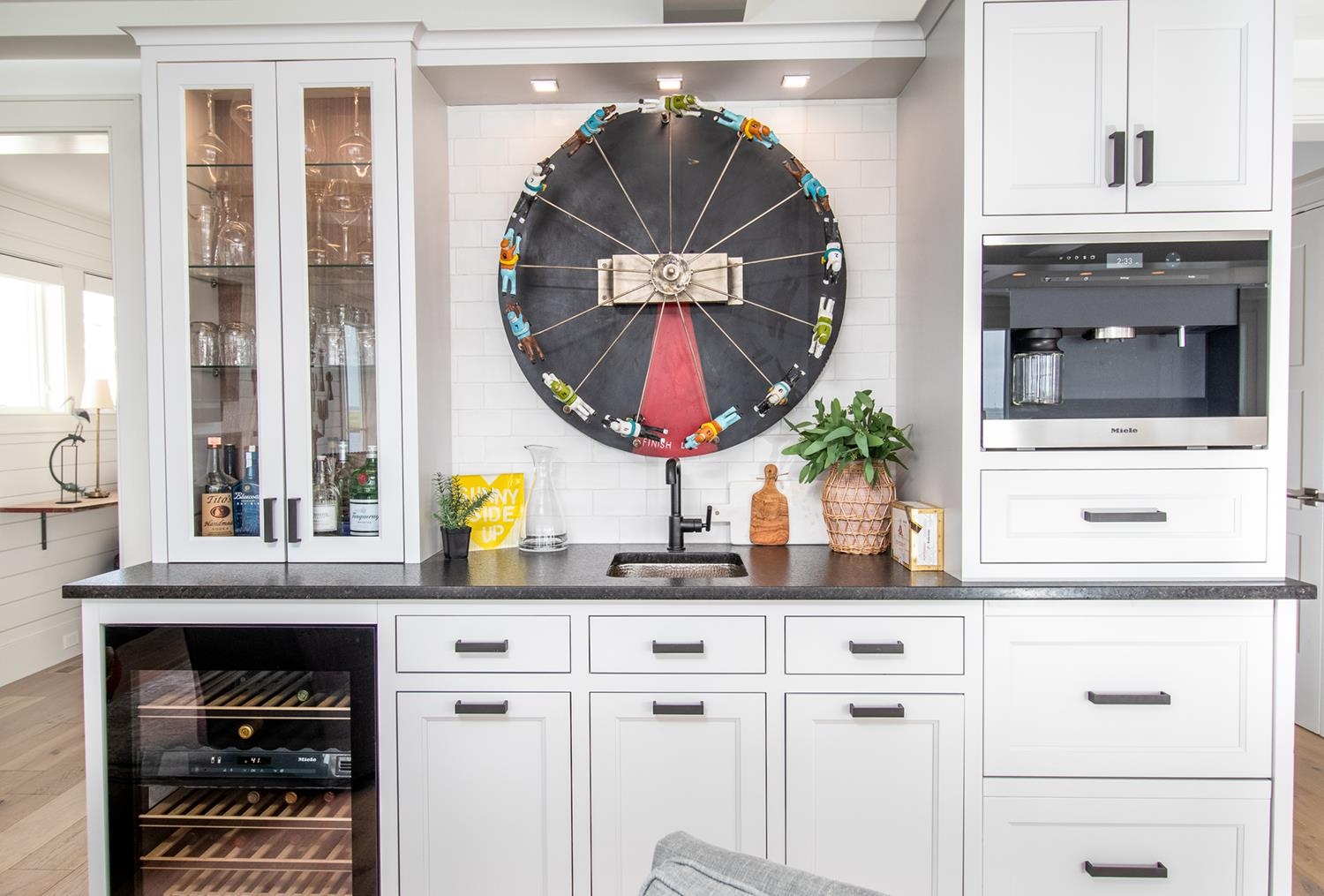 7708 Sunset Drive Avalon, NJ 08202 - Photo 9 of 37 a kitchen with a sink and a stove with wooden floor