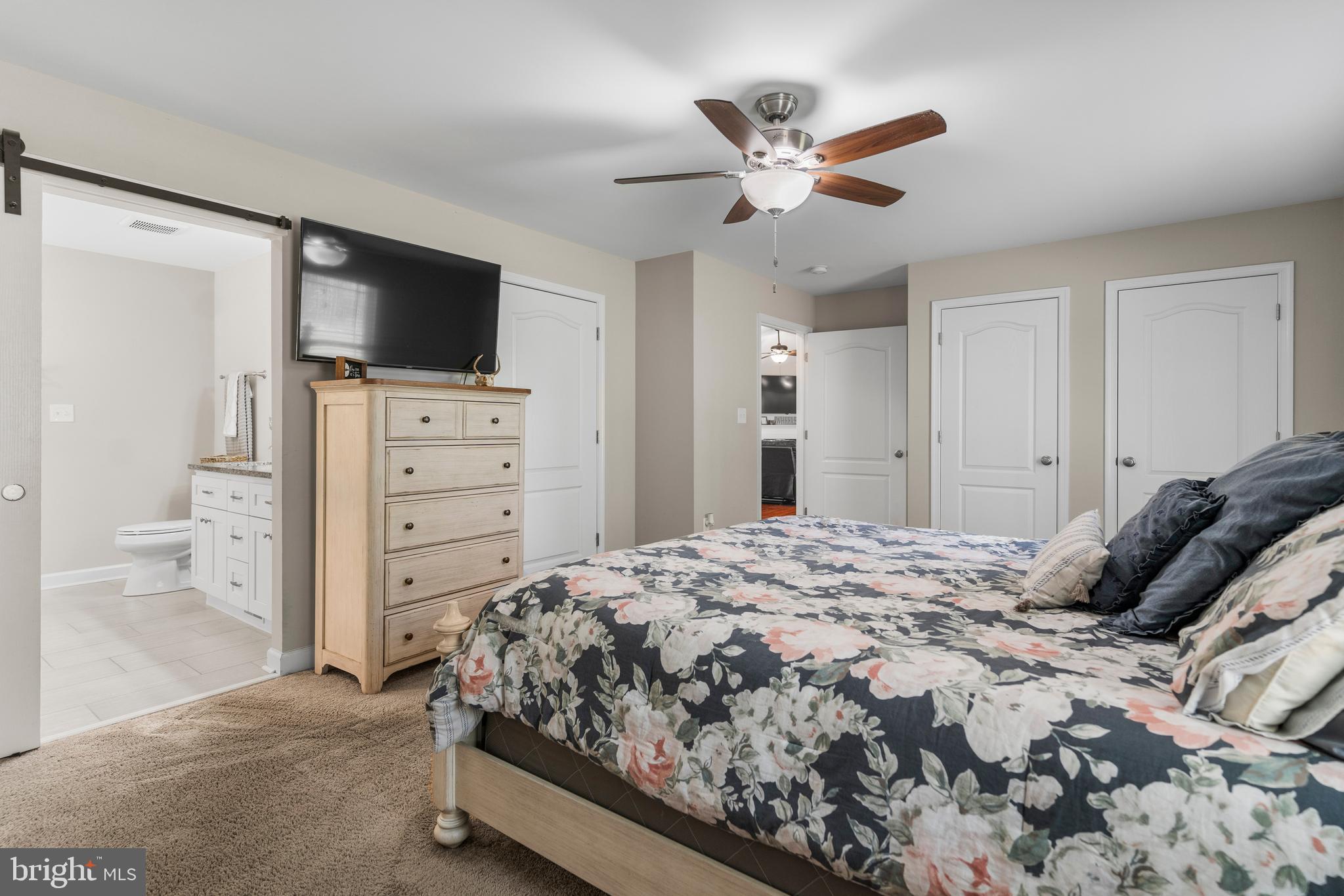 9915 Post Oak Road Spotsylvania, VA 22551 - Photo 16 of 35 Primary w/Sliding Barn Door to Bathroom
