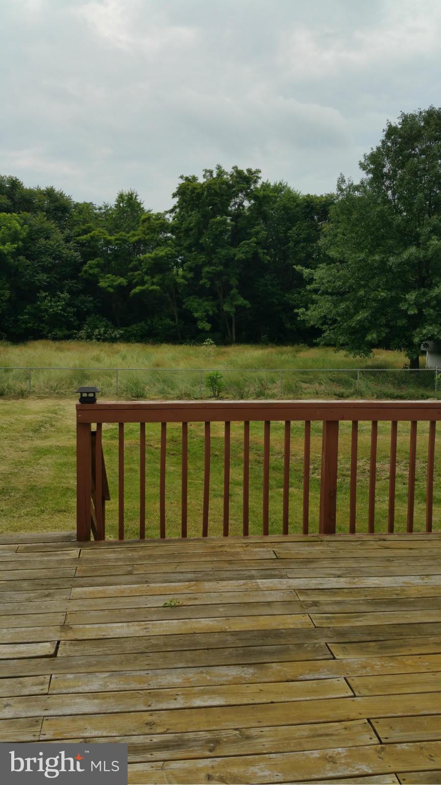 13727 Barnhart Road Clear Spring, MD 21722 - Photo 11 of 20 a balcony with a lake view