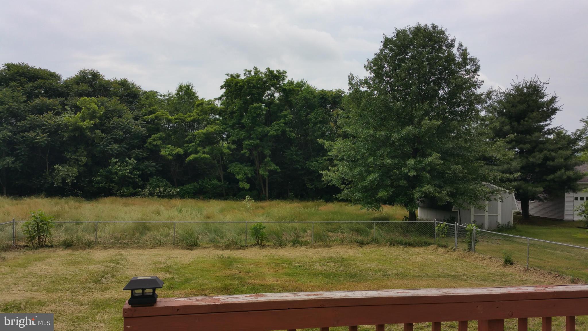 13727 Barnhart Road Clear Spring, MD 21722 - Photo 12 of 20 a view of a lake with a yard
