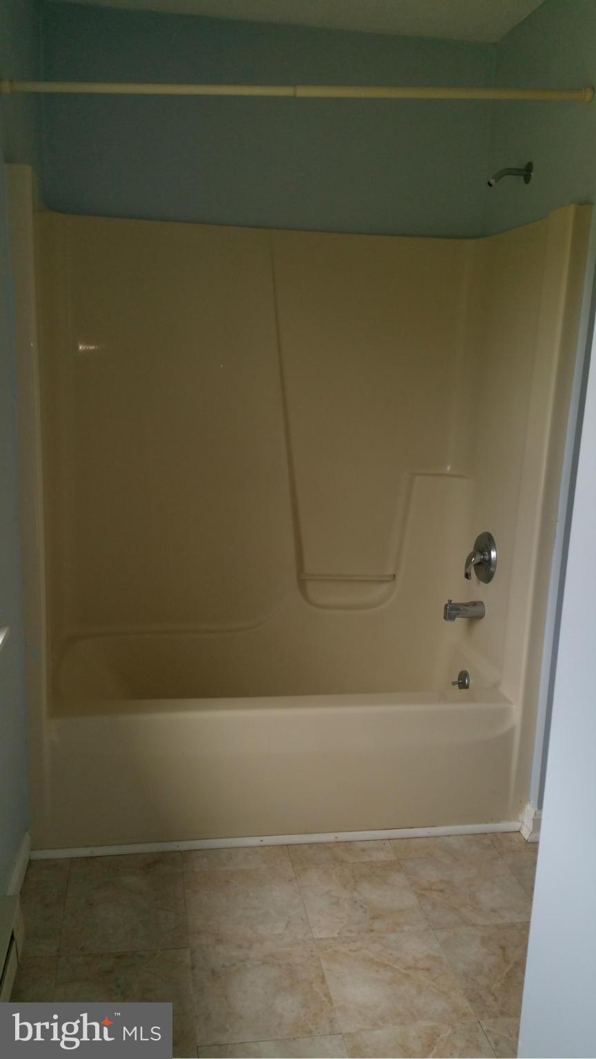 13727 Barnhart Road Clear Spring, MD 21722 - Photo 7 of 20 a bathroom with a bathtub