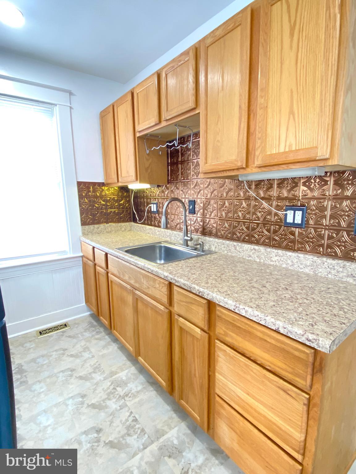 6 Goeller Avenue Baltimore, MD 21221 - Photo 22 of 43 New Kitchen Floor Installed