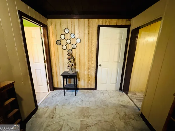 a bed room with a bed and furniture