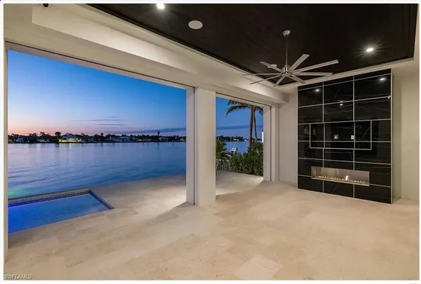 a picture of a tree in front of a house