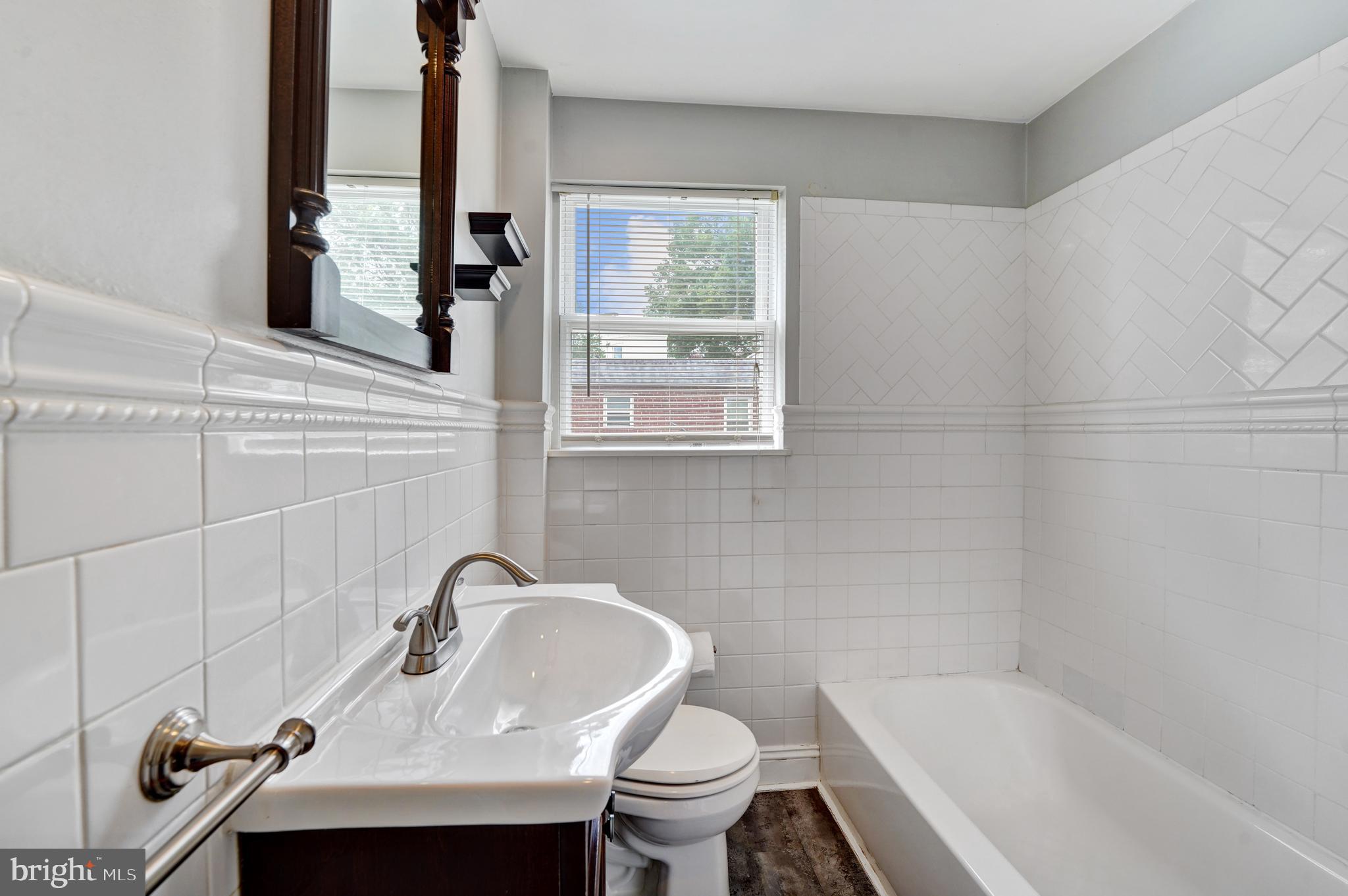 47 Greenhill Road Media, PA 19063 - Photo 19 of 26 Updated ceramic tile hall bathroom