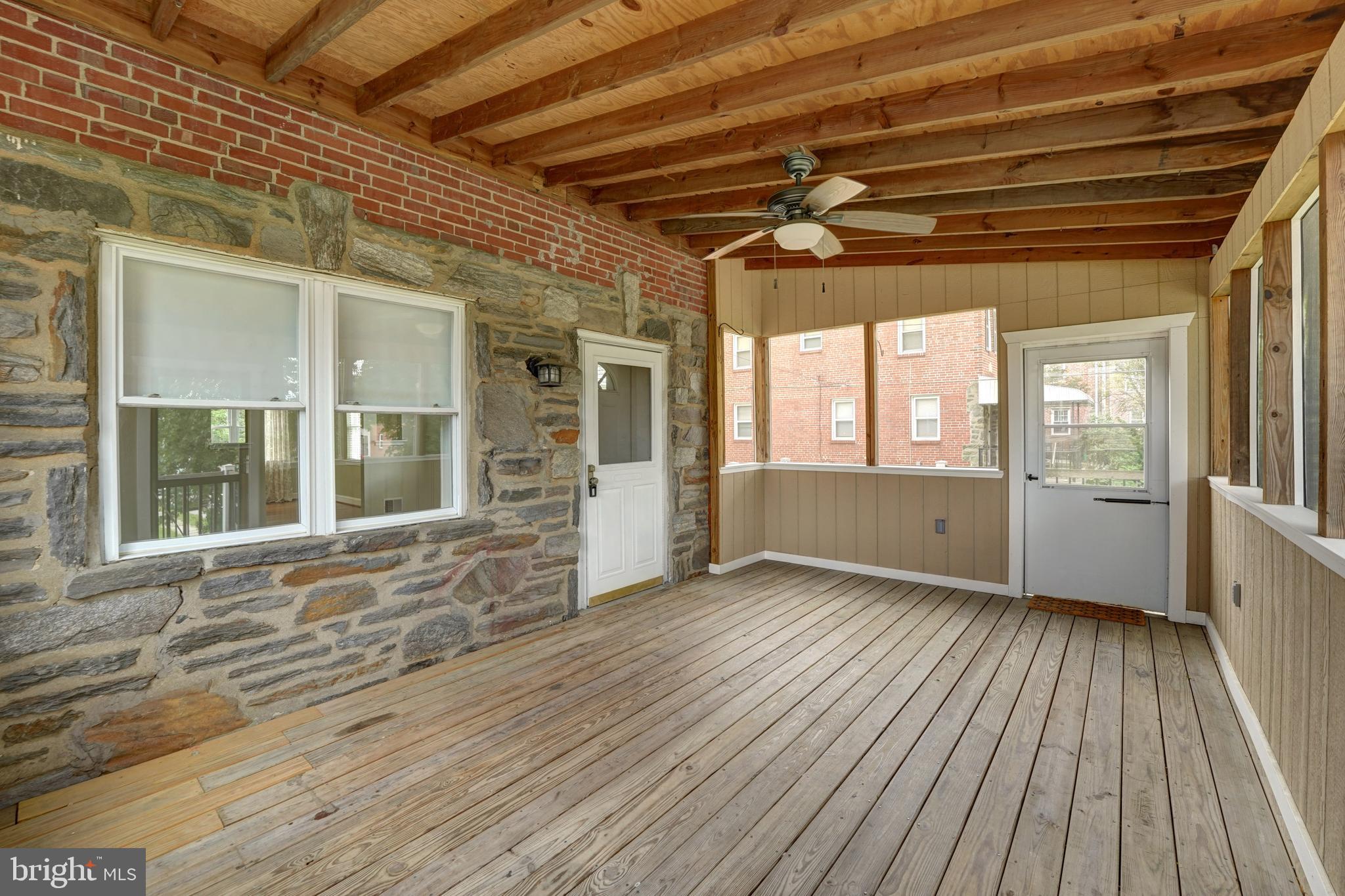 47 Greenhill Road Media, PA 19063 - Photo 3 of 26 Screened porch with exit to side deck