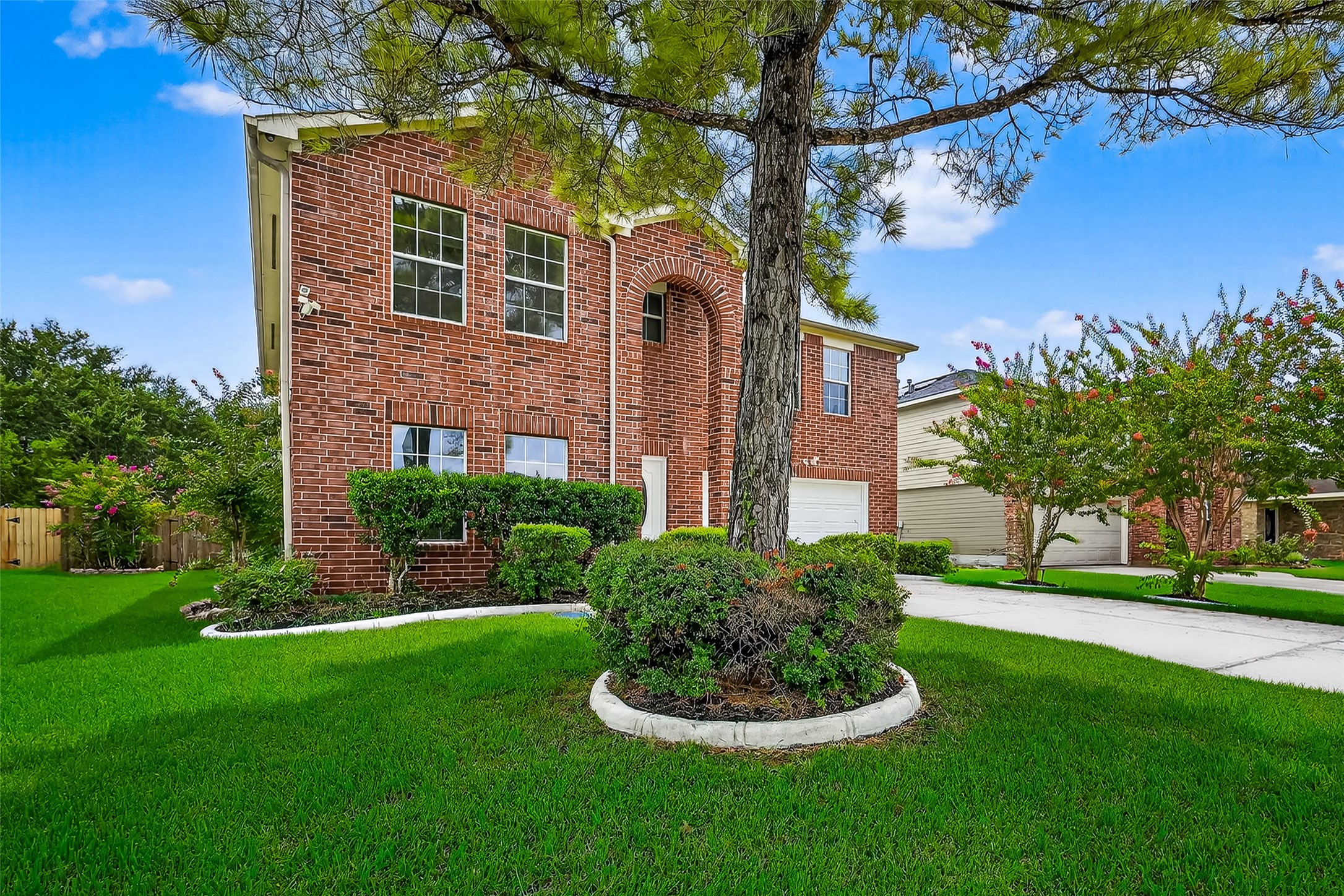 634 Hawthorne Pasture Road Rosenberg, TX 77471 - Photo 2 of 49 a front view of a house with a yard and garage