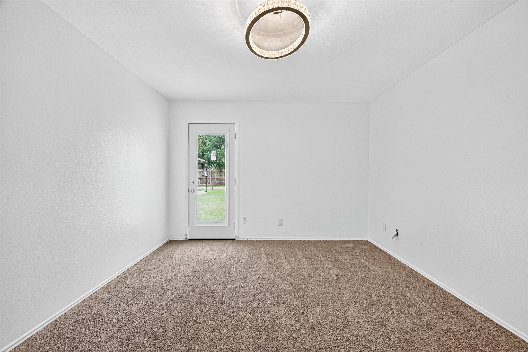 634 Hawthorne Pasture Road Rosenberg, TX 77471 - Photo 23 of 49 a view of room with window and wooden floor