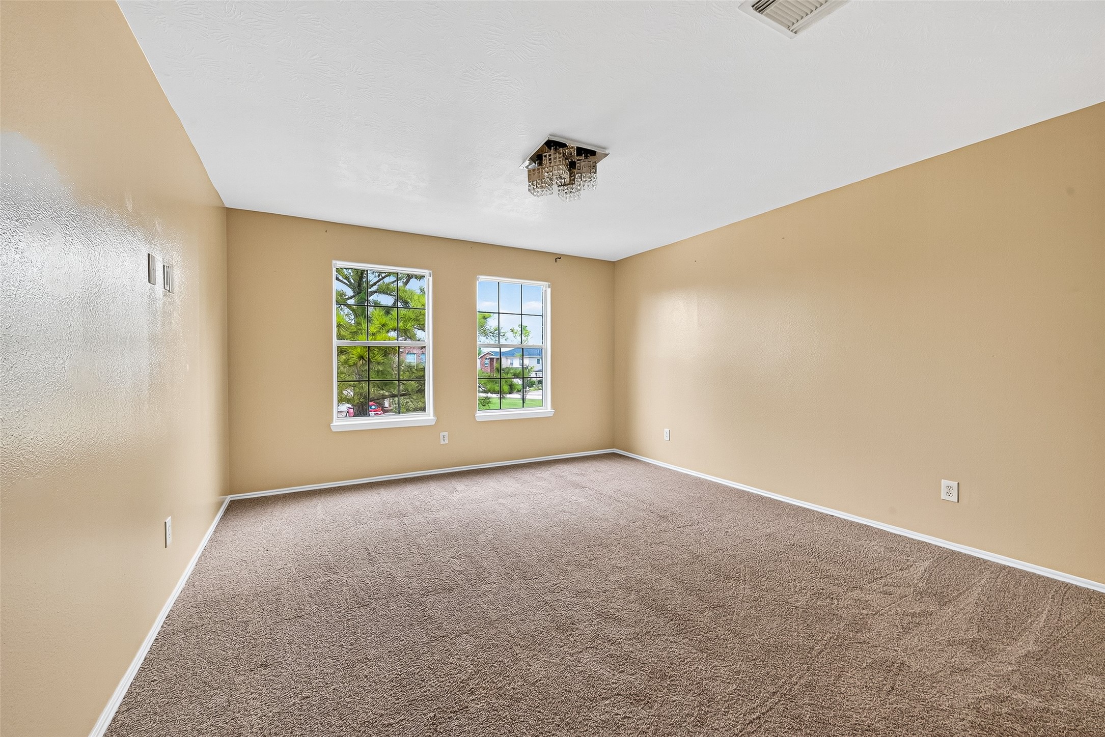 634 Hawthorne Pasture Road Rosenberg, TX 77471 - Photo 30 of 49 a view of a livingroom with a ceiling fan and window