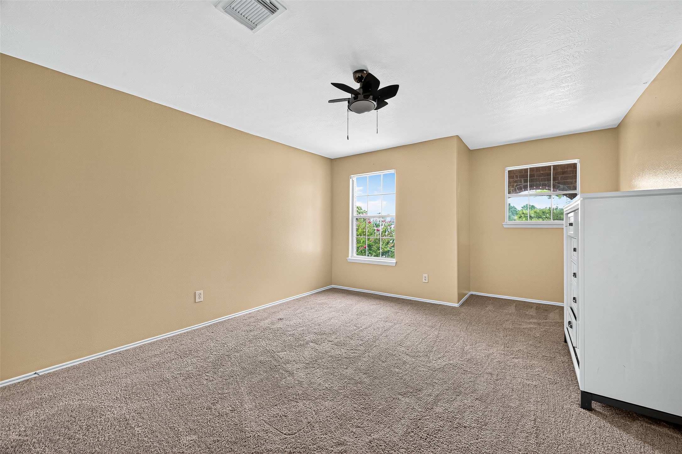 634 Hawthorne Pasture Road Rosenberg, TX 77471 - Photo 32 of 49 a view of an empty room with a window