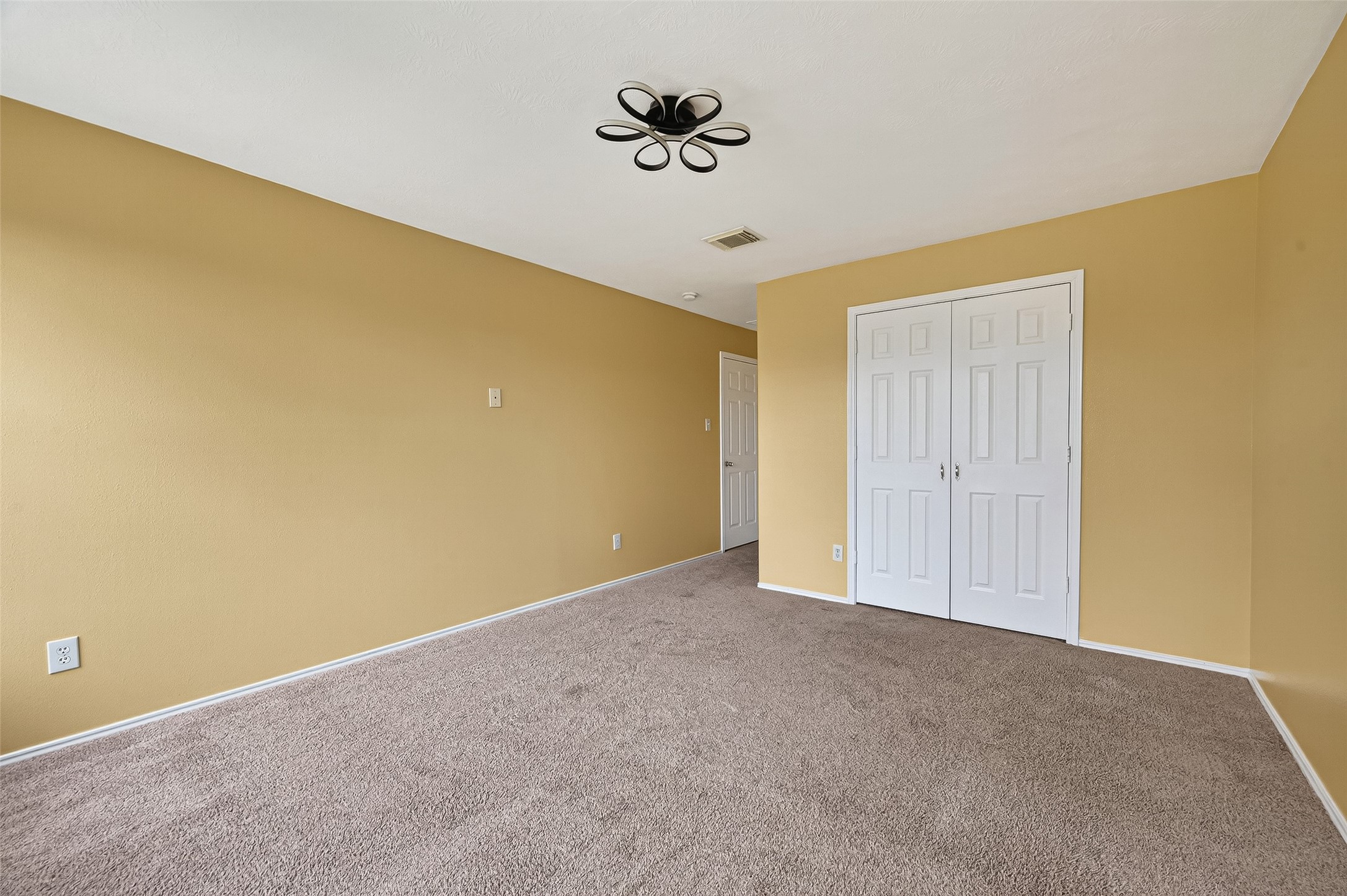 634 Hawthorne Pasture Road Rosenberg, TX 77471 - Photo 36 of 49 a view of an empty room with a window