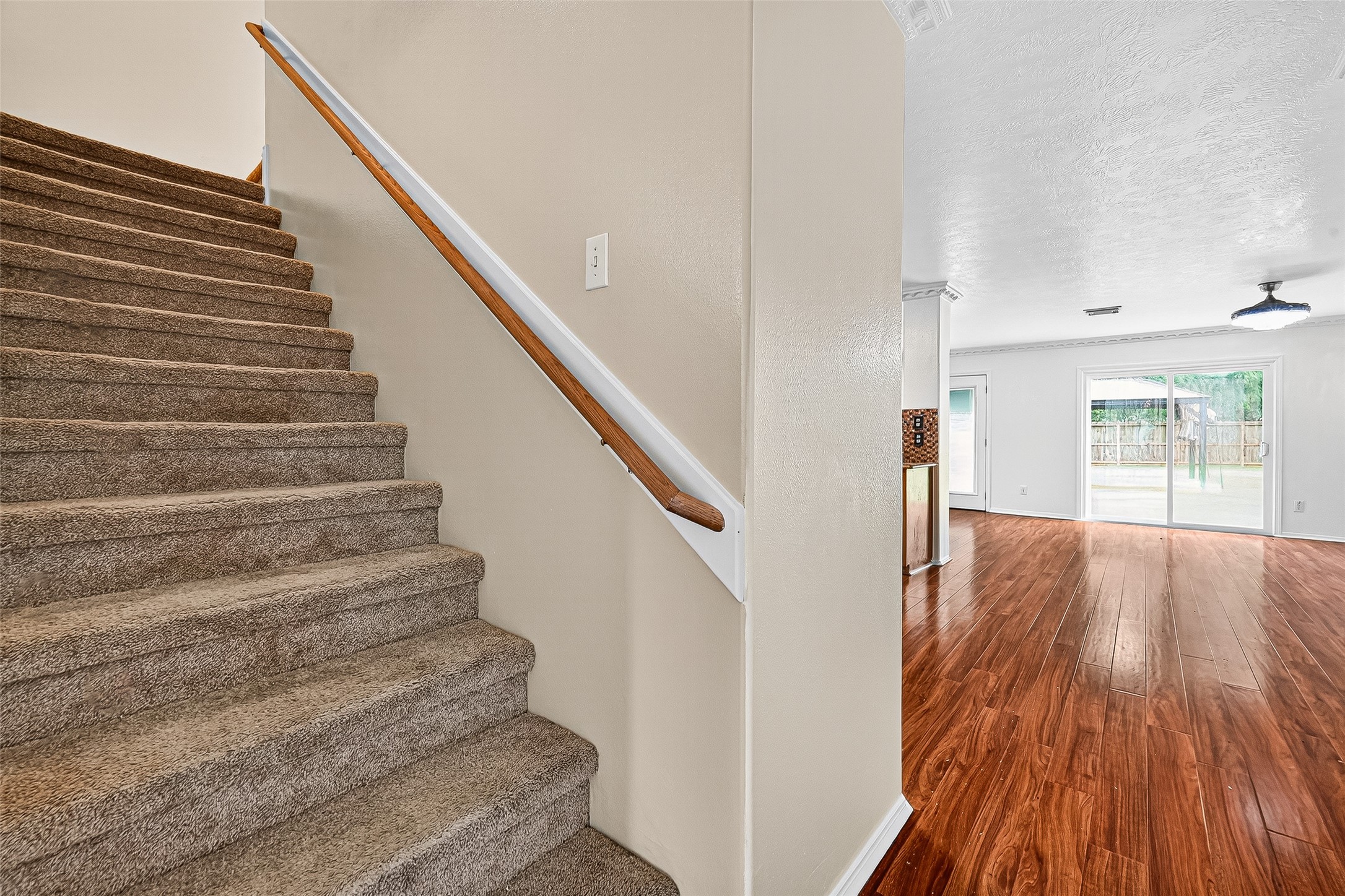 634 Hawthorne Pasture Road Rosenberg, TX 77471 - Photo 9 of 49 a view of entryway and hall with wooden floor