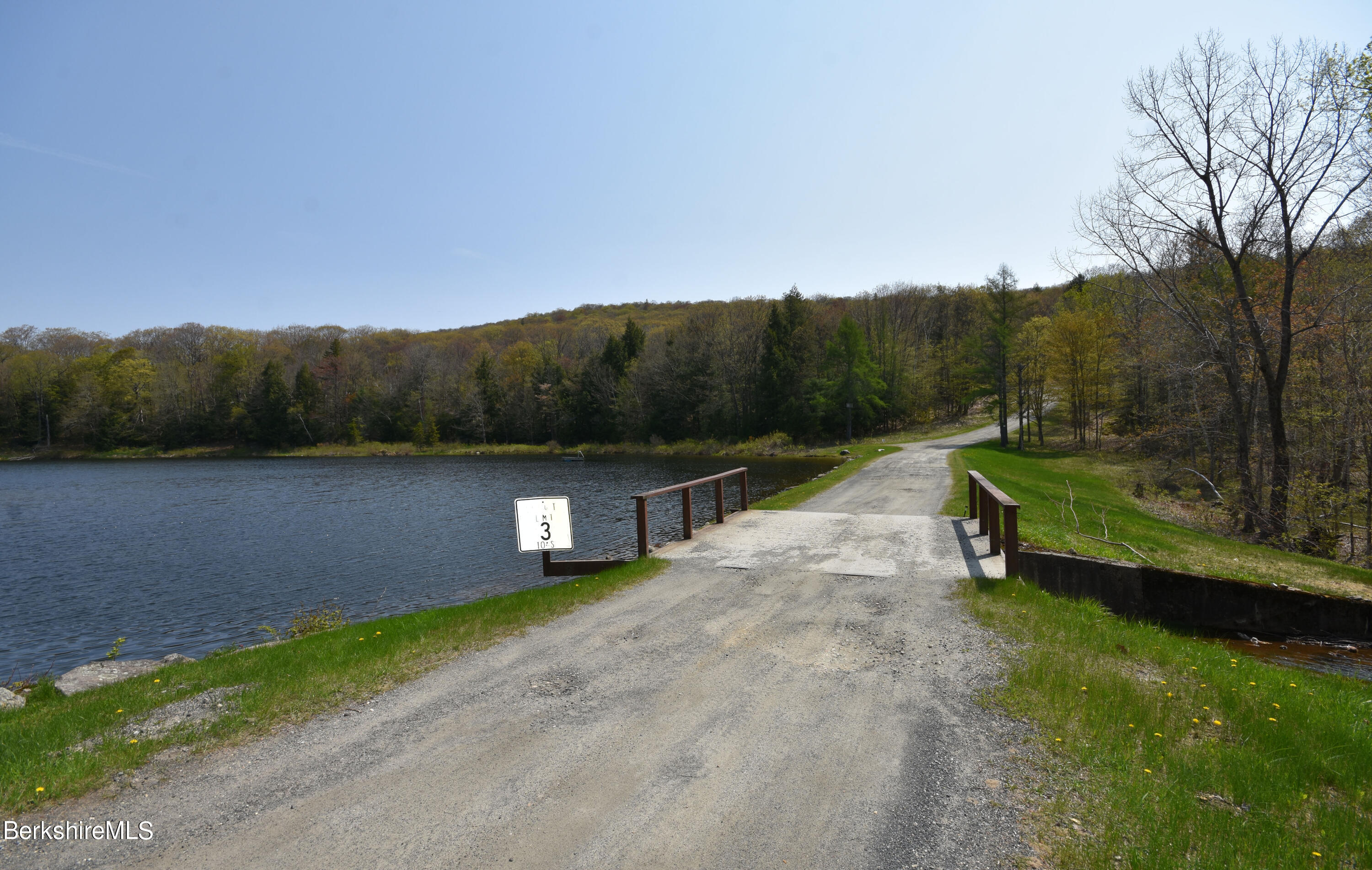 0 Lake View Road Hinsdale, MA 01235 - Photo 5 of 18 a view of a back yard with a lake view