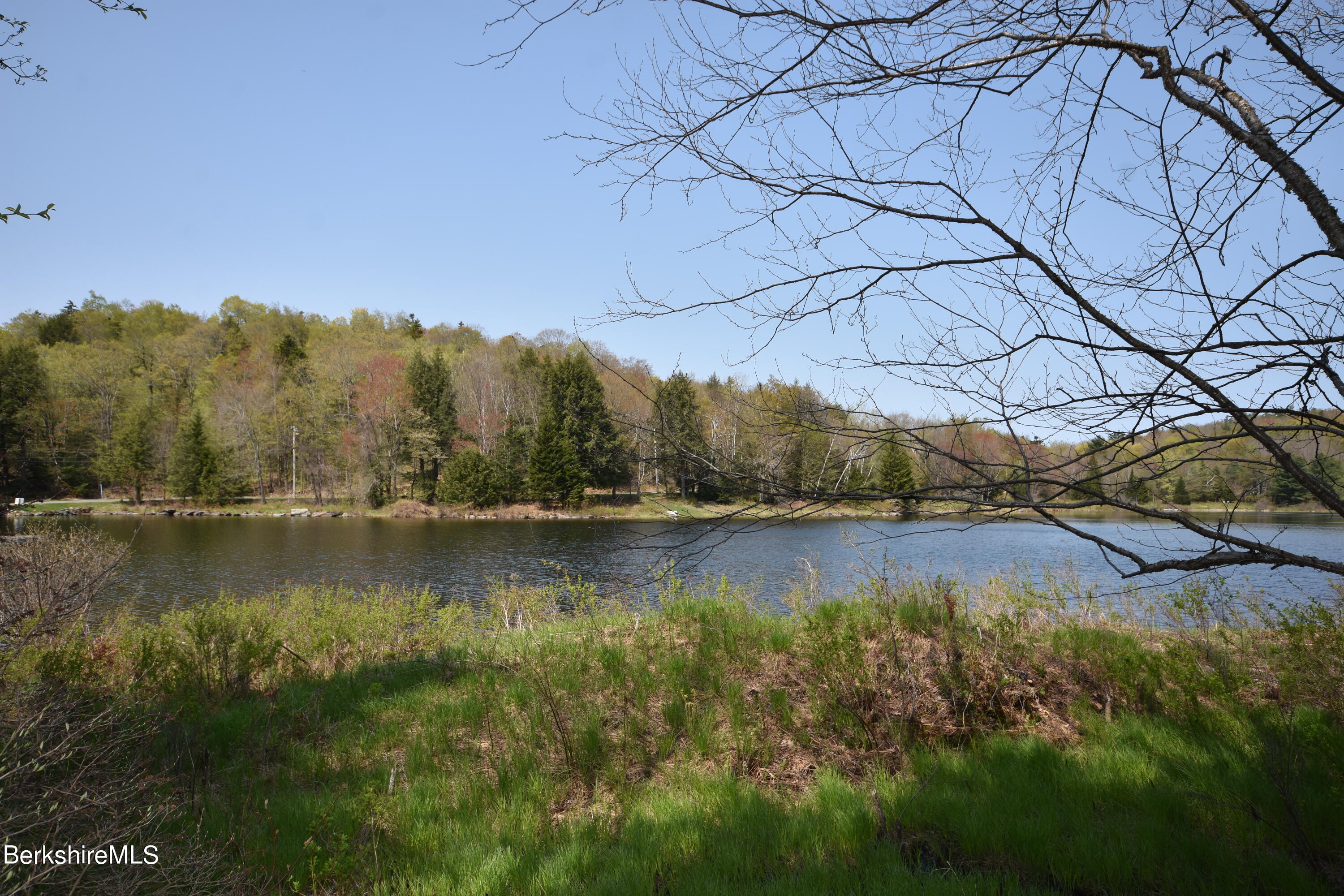 0 Lake View Road Hinsdale, MA 01235 - Photo 8 of 18 a view of a lake with houses in the back