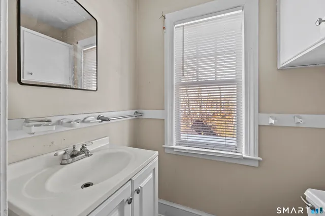 a view of entryway with a front door