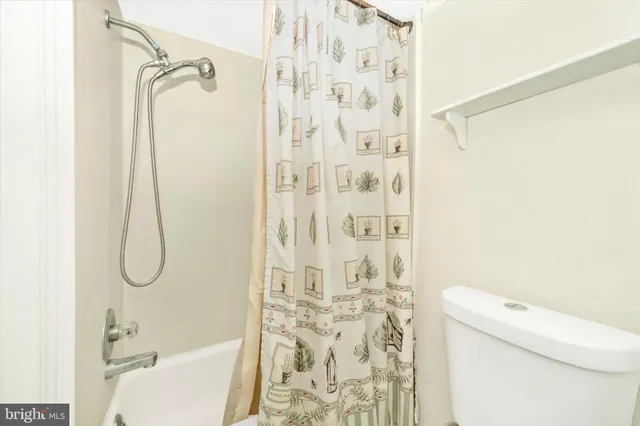 a view of a balcony with wooden floor