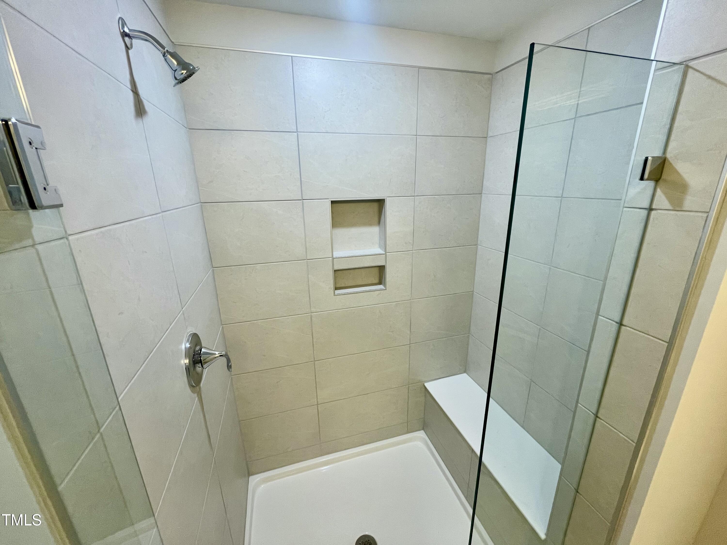 2107 Lambert Road, Unit 64 Cary, NC 27519 - Photo 32 of 77 21. primary luury shower with built in s