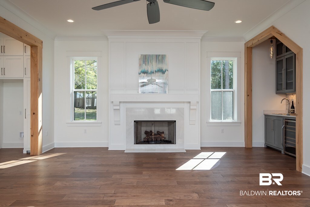 389 Pecan Avenue Fairhope, AL 36532 - Photo 7 of 50 Custom built beams and fireplace like no other!