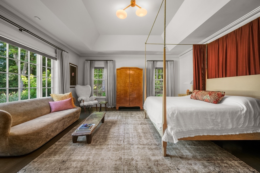 100 Chestnut Street Weston, MA 02493 - Photo 17 of 17 a bedroom with a bed couch and window