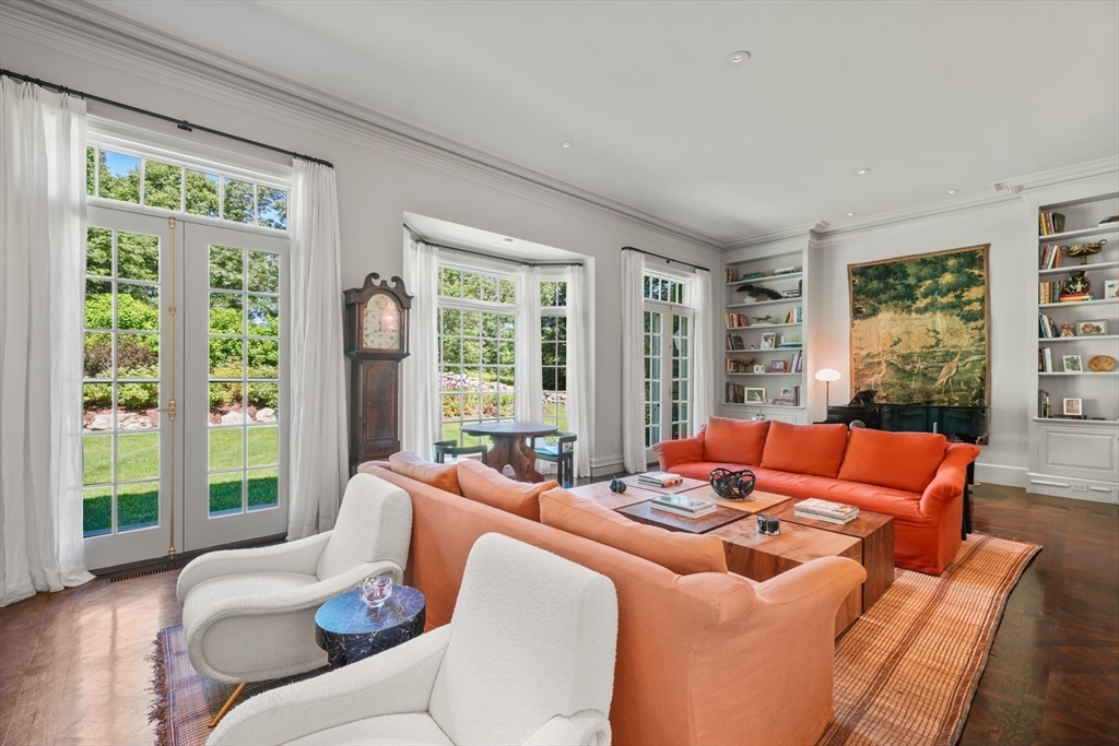 100 Chestnut Street Weston, MA 02493 - Photo 4 of 17 a living room with furniture and a large window