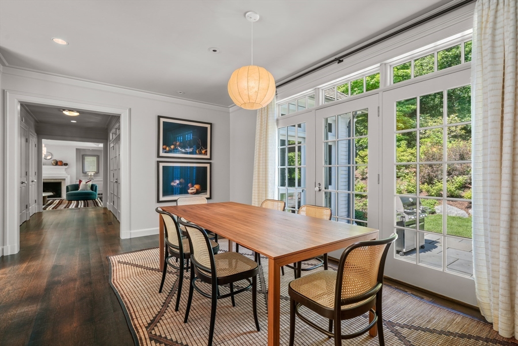 100 Chestnut Street Weston, MA 02493 - Photo 8 of 17 a view of a dining room with furniture window and wooden floor