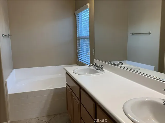 a bathroom with a sink and a bathtub