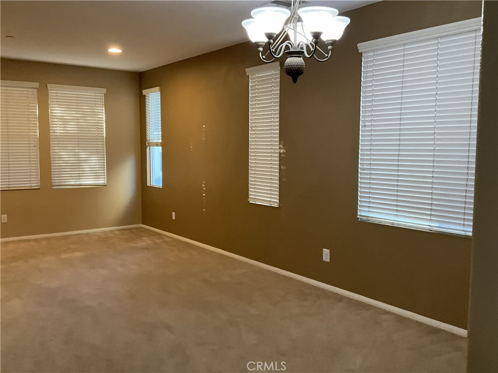 4574 Sandano Street Riverside, CA 92507 - Photo 6 of 12 a view of an empty room with a window