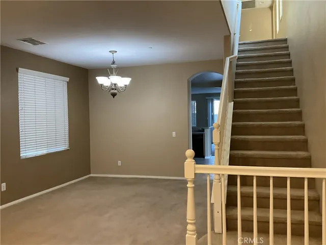 a view of a room with a large window