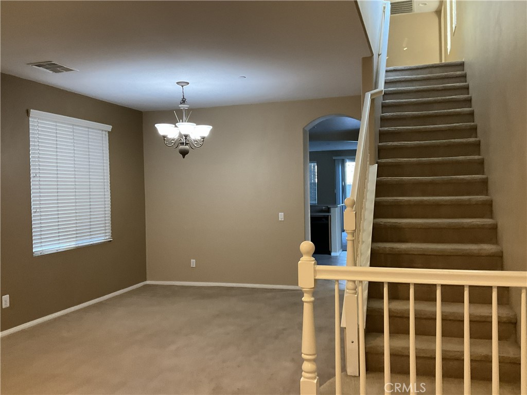 4574 Sandano Street Riverside, CA 92507 - Photo 8 of 12 a view of a room with a large window
