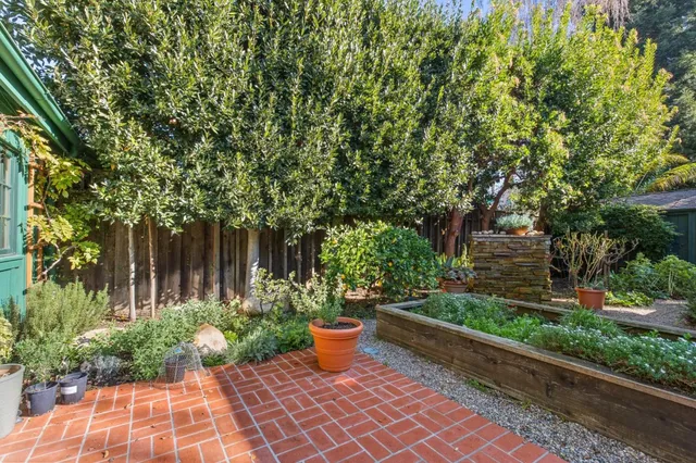 a garden view with a seating space