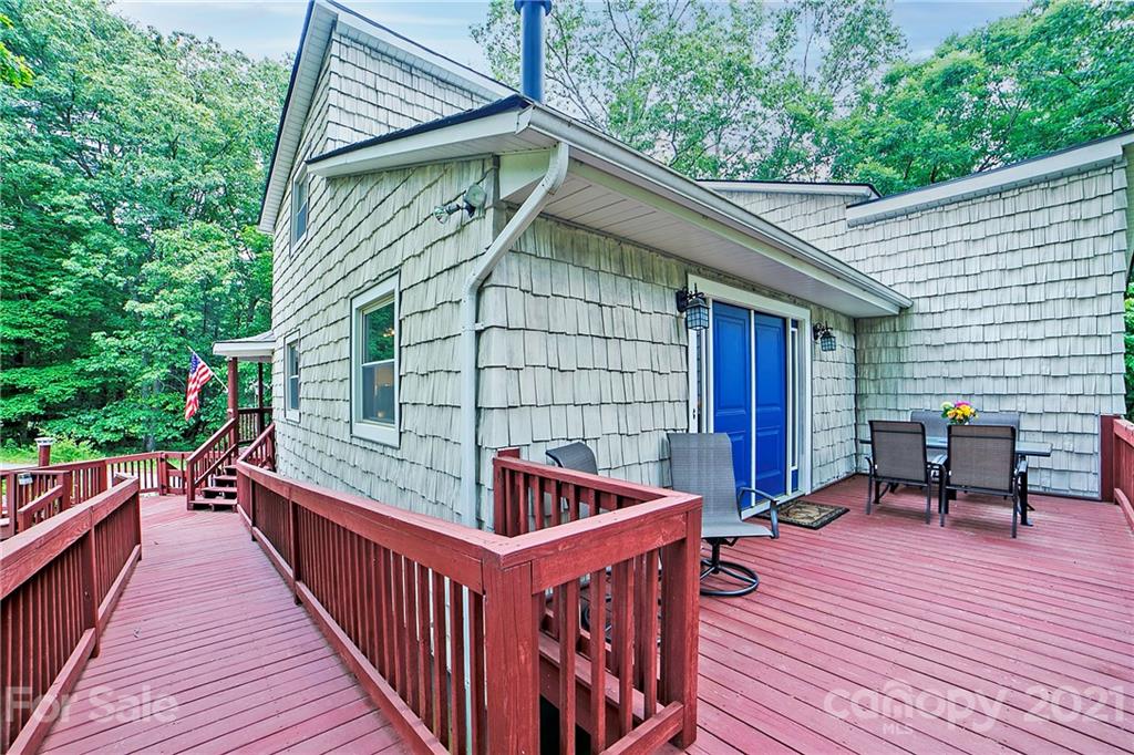 2 Arnstein Circle Fletcher, NC 28732 - Photo 18 of 29 a balcony with furniture and wooden deck