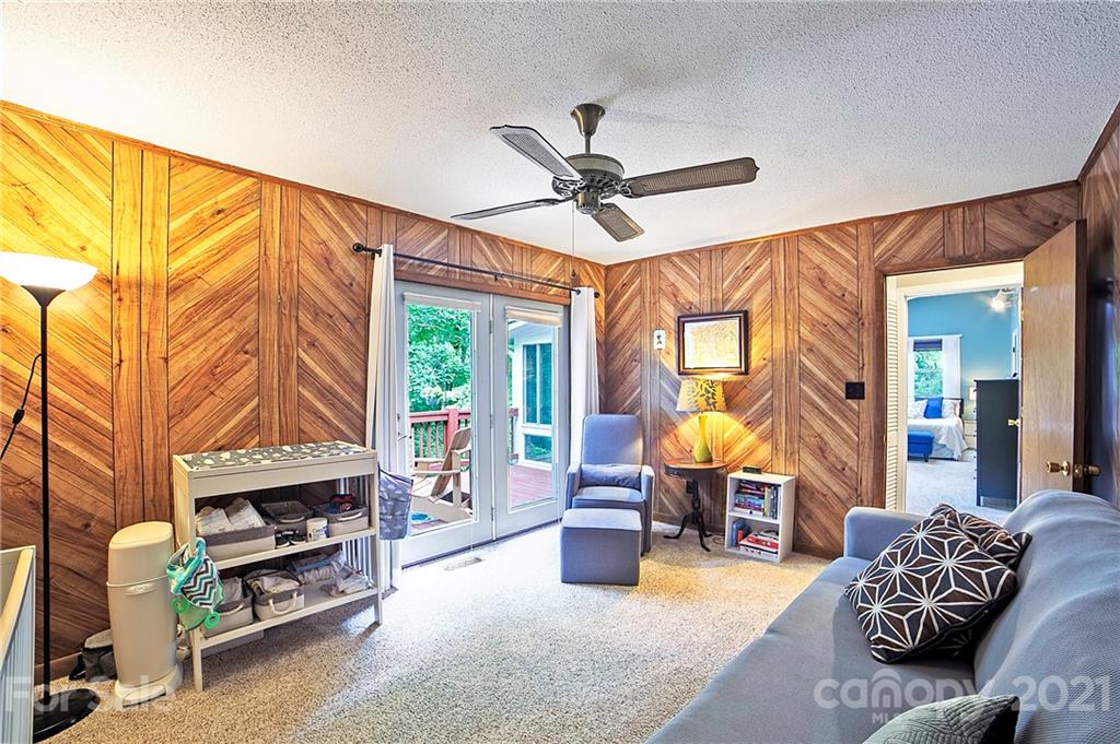 2 Arnstein Circle Fletcher, NC 28732 - Photo 20 of 29 a bedroom with furniture and a fireplace