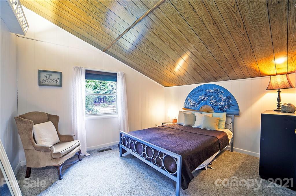 2 Arnstein Circle Fletcher, NC 28732 - Photo 24 of 29 a large bedroom with a bed and window