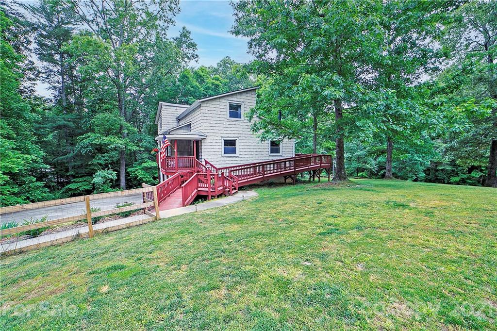 2 Arnstein Circle Fletcher, NC 28732 - Photo 28 of 29 a view of a house with backyard and sitting area
