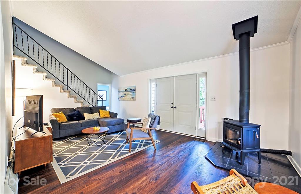 2 Arnstein Circle Fletcher, NC 28732 - Photo 5 of 29 a living room with furniture and a wooden floor