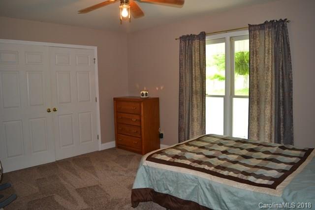 309 Parker Road York, SC 29745 - Photo 14 of 25 a bedroom with a bed and a window