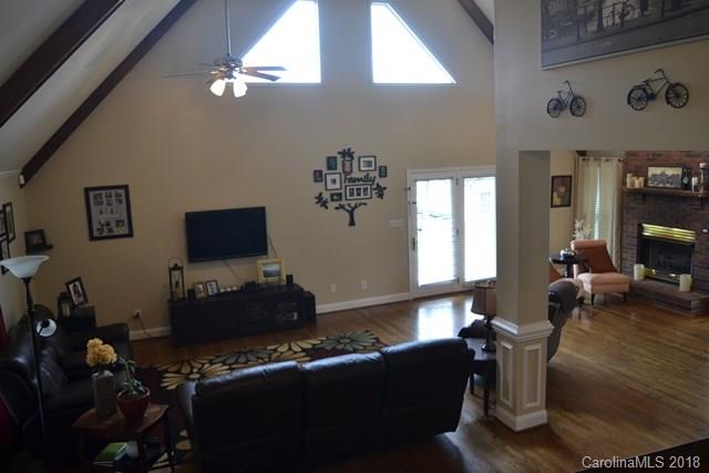 309 Parker Road York, SC 29745 - Photo 6 of 25 a living room with furniture and a flat screen tv