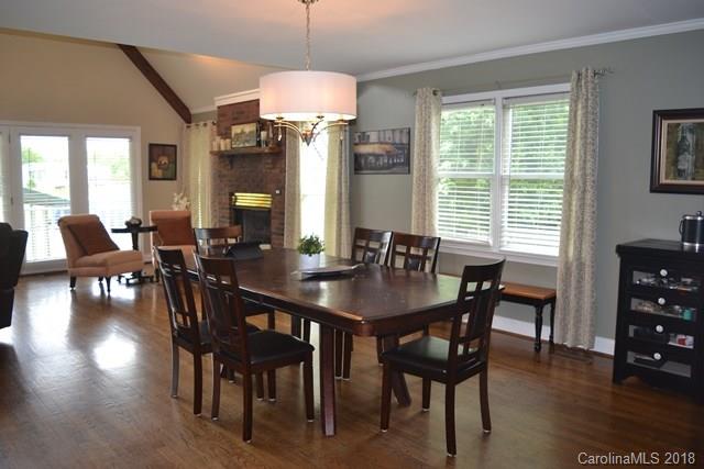 309 Parker Road York, SC 29745 - Photo 7 of 25 a view of a dining room with furniture window and wooden floor